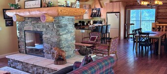 Experience the warmth of our gorgeous log home backing onto the first fairway.