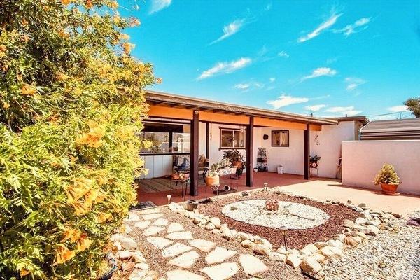 Front entry way, porch and rock garden