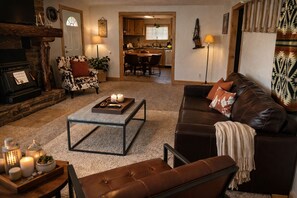 TV, fireplace - Pet Friendly Riverfront Cabins for Group Events and Gatherings - Hot Tub (Dubois)