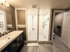 Shower, hair dryer, towels, soap