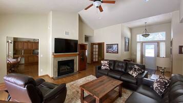 Smart TV, fireplace, DVD player, books