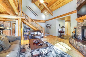 TV, fireplace, books