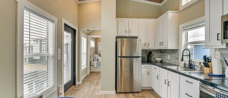 Fridge, microwave, stovetop, coffee/tea maker