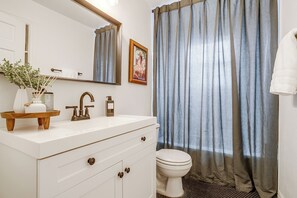 Hair dryer, towels, soap, toilet paper