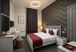 Standaard tweepersoonskamer, 1 kingsize bed, niet-roken, uitzicht op stad | Luxe beddengoed, een minibar, een kluis op de kamer