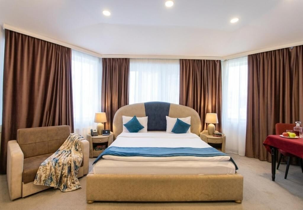 Luxury Room, Non Smoking, City View | Premium bedding, minibar, in-room safe, individually decorated