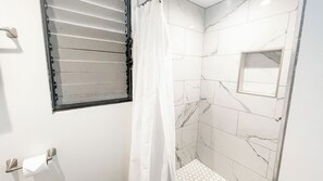 Shower, hair dryer, towels, soap