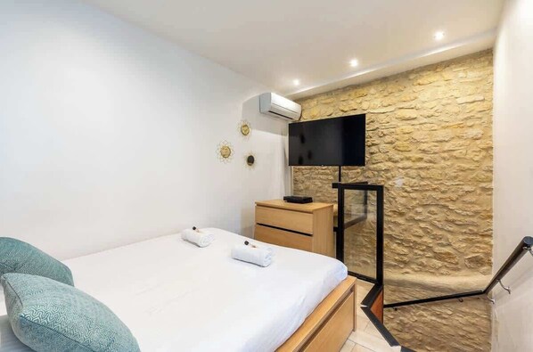 1 chambre, fer et planche à repasser, Wi-Fi, literie fournie