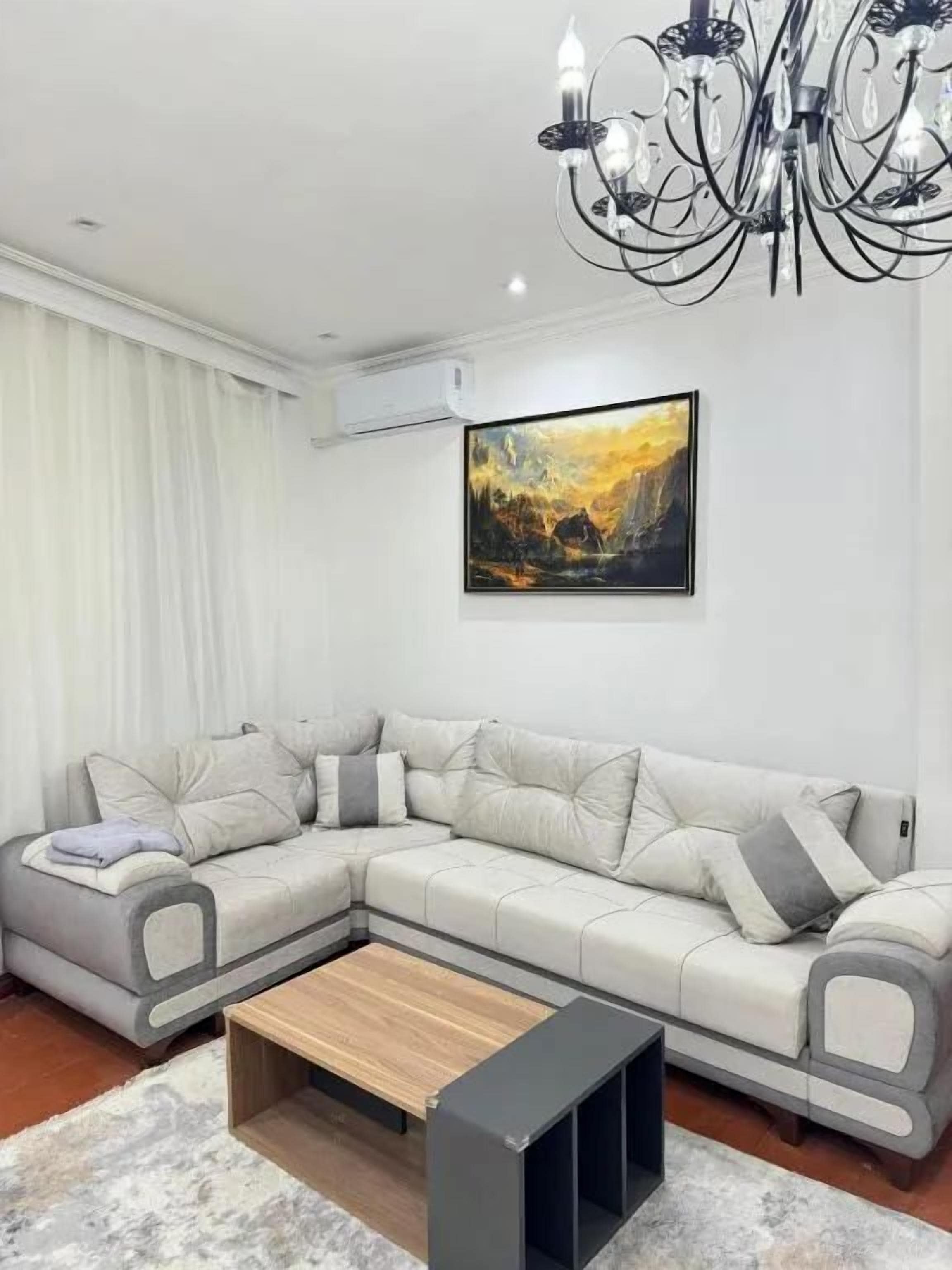 Apartment | Living area | 33-inch LED TV with satellite channels