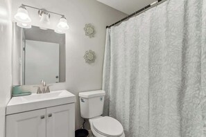 Hair dryer, towels, soap, toilet paper