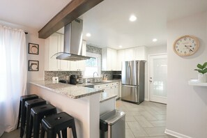 Fridge, microwave, oven, stovetop - Modern & Cozy Home - Minutes from NoDa & Uptown (Charlotte)