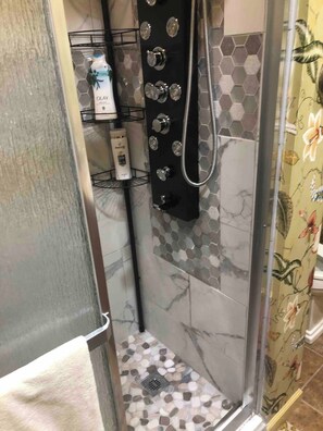 Shower, jetted bath, eco-friendly toiletries, hair dryer