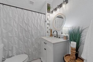 Hair dryer, towels, soap, toilet paper