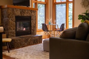 Smart TV, fireplace, books