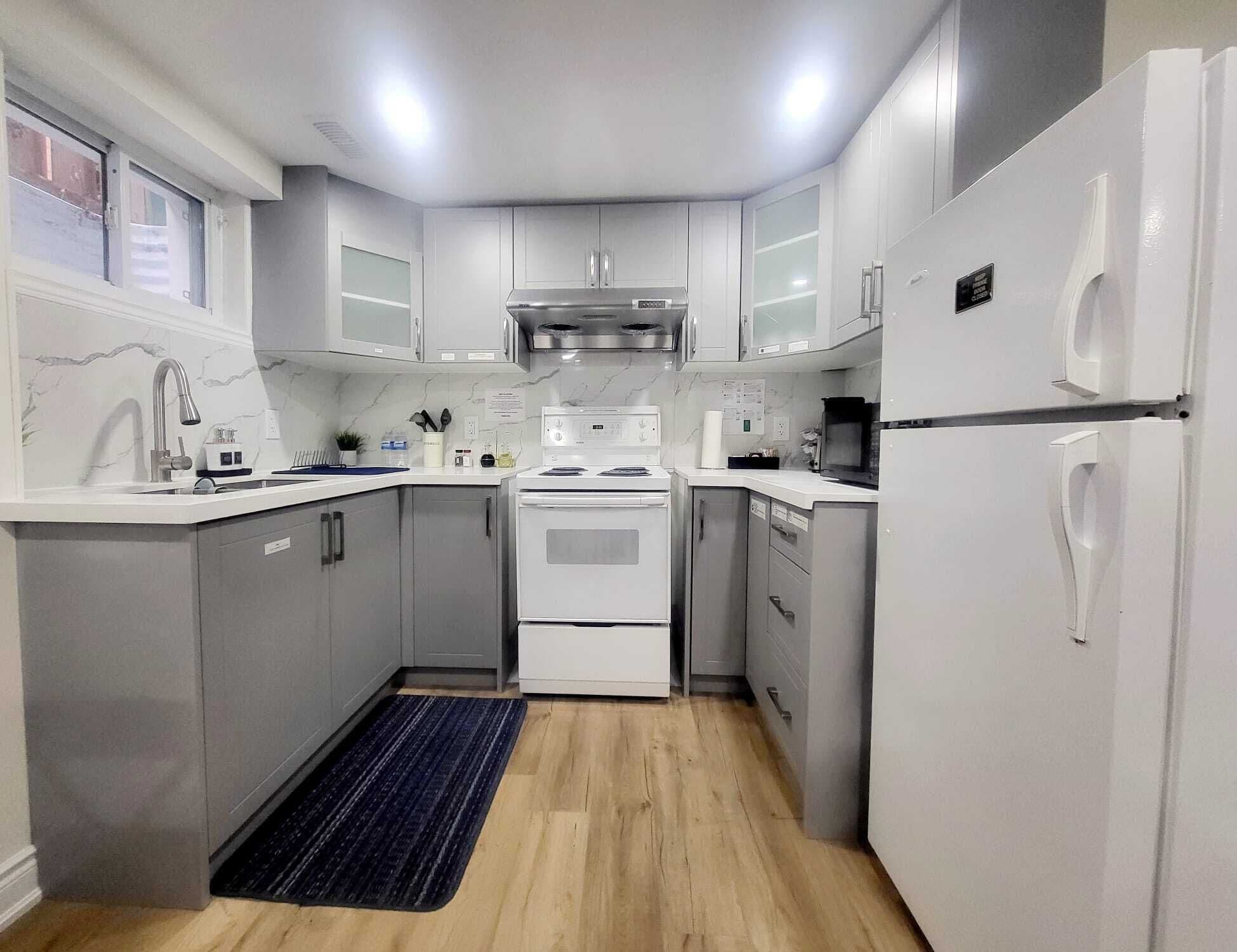 Fridge, coffee/tea maker, electric kettle, toaster