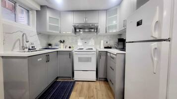 Fridge, coffee/tea maker, electric kettle, toaster