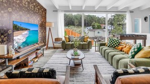 TV, fireplace, books, stereo - New Themed Coastal 4Bed w/ Pool/Arcades/Foosball (Montara)