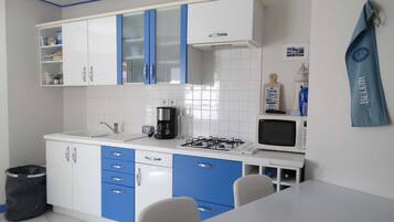 Fridge, microwave, toaster, cookware/dishes/utensils