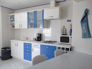 Fridge, microwave, toaster, cookware/dishes/utensils