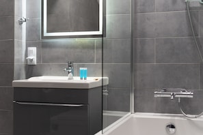 Hair dryer, towels, soap, shampoo