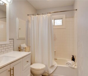 Hair dryer, towels, soap, toilet paper