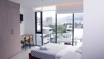 Comfort Apartment, City View | 1 bedroom, desk, laptop workspace, iron/ironing board