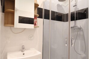 Shower, hair dryer, soap, shampoo