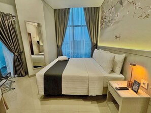 Superior Room, Balcony, City View | In-room safe, desk, laptop workspace, soundproofing - Nemuru Grand Suites MT Haryono (Jakarta)