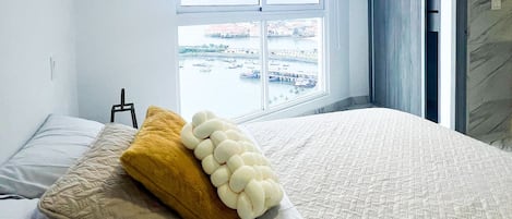 2 bedrooms, desk, laptop workspace, iron/ironing board