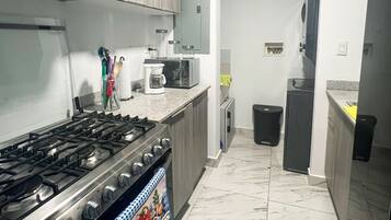 Fridge, microwave, stovetop, cookware/dishes/utensils