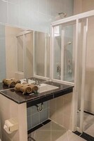 Shower, towels, soap, shampoo