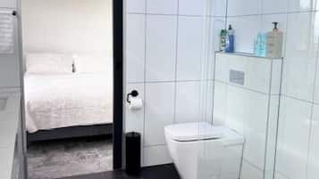 Shower, eco-friendly toiletries, hair dryer, towels