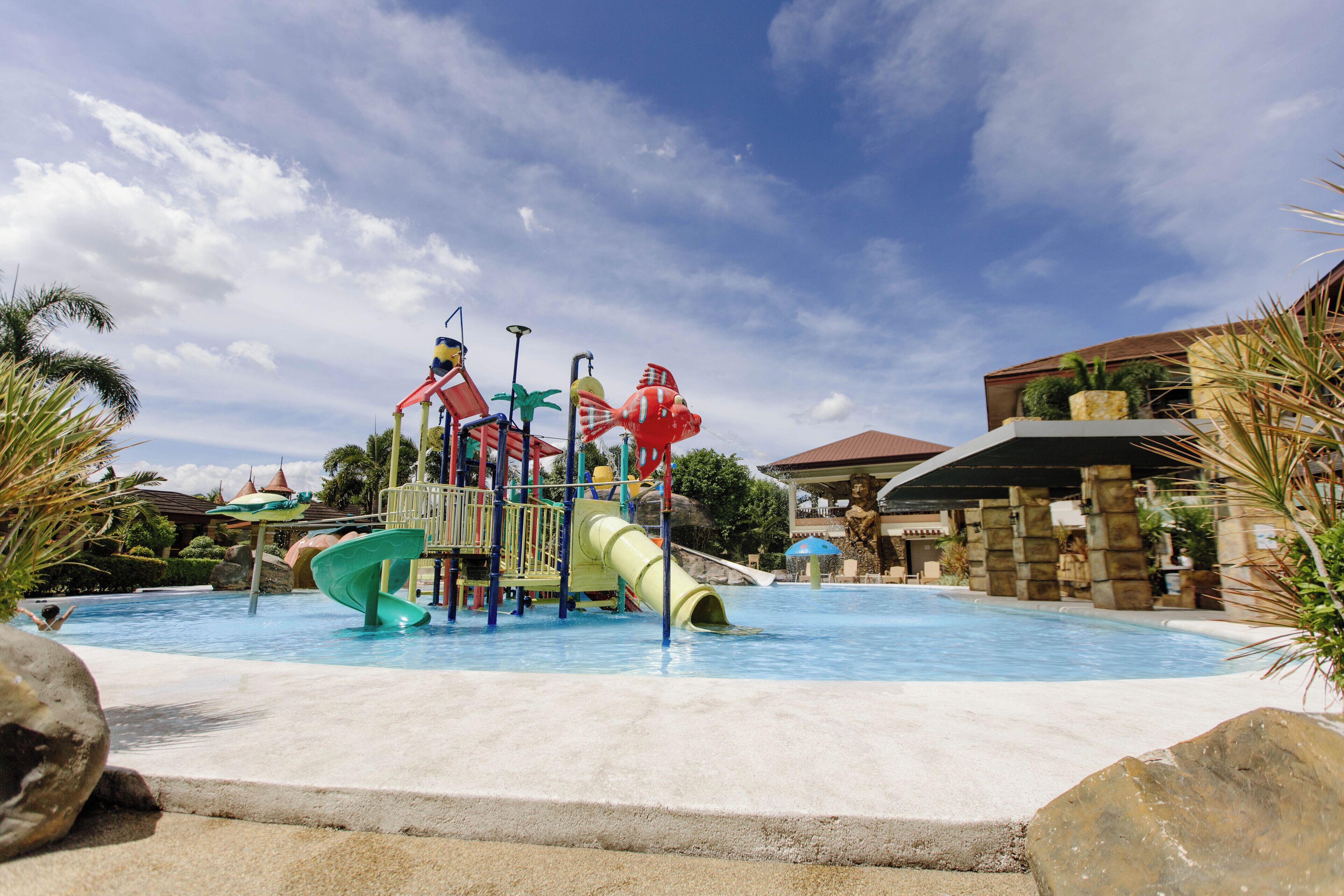 A water park with slides and play structures.