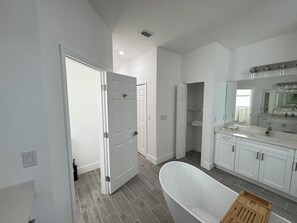 Shower, hair dryer, towels, soap - Cozy New Construction Home in Cape Coral (Cape Coral)