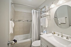 Jetted bath, hair dryer, towels