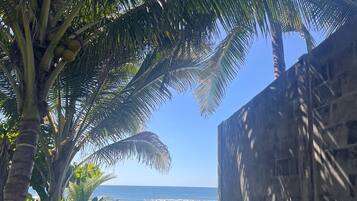 On the beach, sun-loungers, beach towels