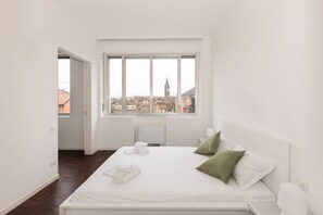 1 غرفة نوم ومكواة/لوح كي وواي فاي وملاءات أسرّة