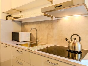 Fridge, dishwasher, cookware/dishes/utensils