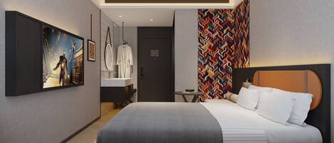 A modern hotel room with a large bed, a television, a bathroom with a mirror, and a colorful wall pattern.