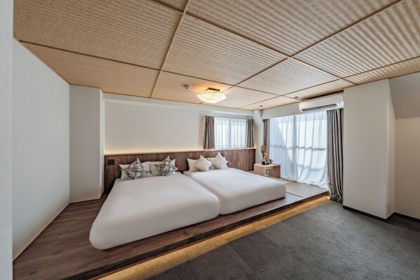 ห้องแฟมิลี่สำหรับสี่ท่าน, เตียงใหญ่ 2 เตียง, ปลอดบุหรี่ | 1 ห้องนอน, ผ้าม่านกันแสง, Wi-Fi ฟรี