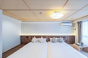 Chambre Deluxe avec lits jumeaux, 2 lits doubles, non-fumeurs | 1 chambre, rideaux occultants, Wi-Fi gratuit