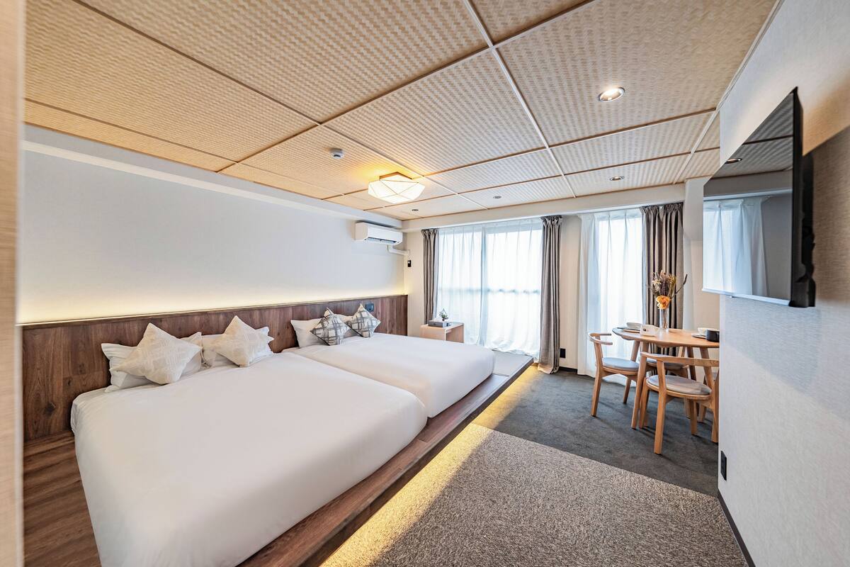 Deluxe-Zweibettzimmer, 2 Doppelbetten, Nichtraucher | Verdunkelungsvorhänge, kostenloses WLAN