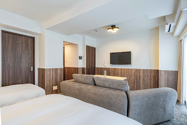 Suite familiar, balcón, vista a la ciudad | Wifi gratis
