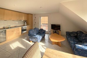 Living area - Fantastic vacation apartment directly on the dike (Wurster Nordseeküste)