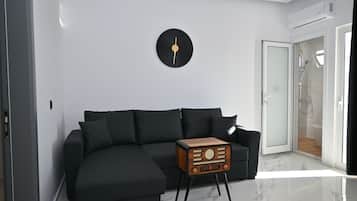 Habitación familiar, vista al parque | Ropa de cama de alta calidad y caja de seguridad en la habitación