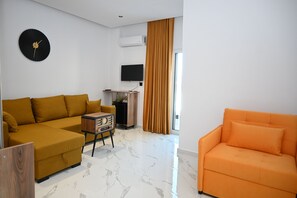 Familiekamer, uitzicht op zee | Luxe beddengoed, een kluis op de kamer, geluiddichte muren, gratis wifi