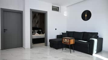 Habitación familiar, vista al parque | Ropa de cama de alta calidad y caja de seguridad en la habitación