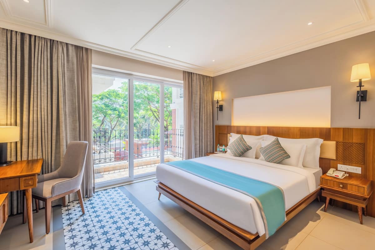 Habitación Grand, vista al jardín | Minibar, escritorio, tabla de planchar con plancha y wifi gratis