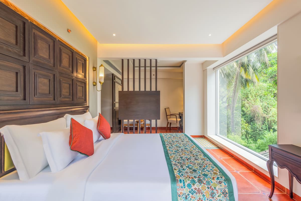 Suite estudio junior, vista al jardín | Minibar, escritorio, tabla de planchar con plancha y wifi gratis