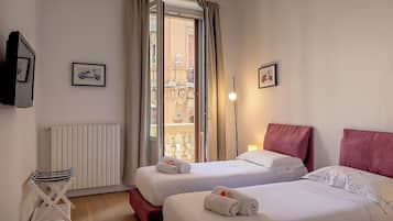 2 quartos, escrivaninha, ferros/tábuas de passar roupa